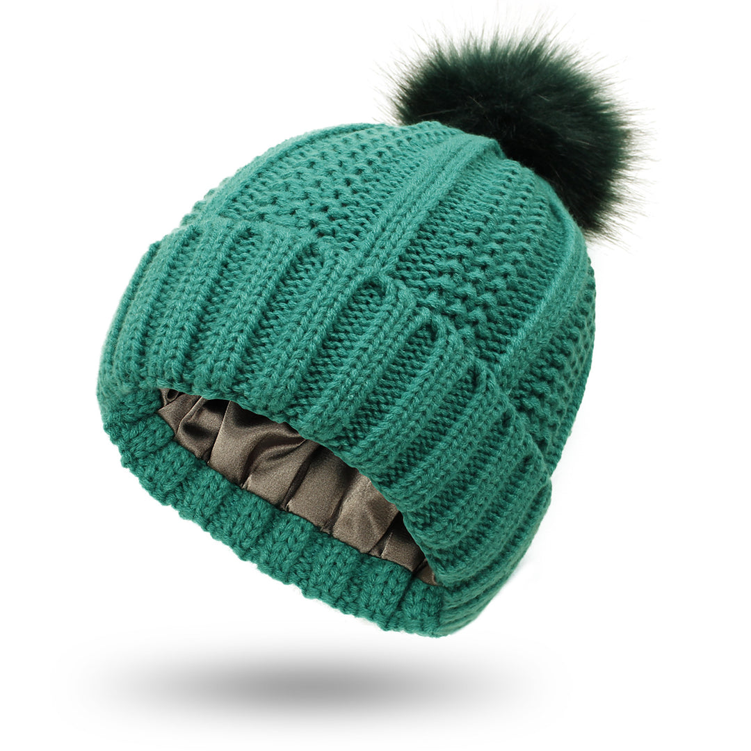 Damska czapka z pomponem z grubej dzianiny